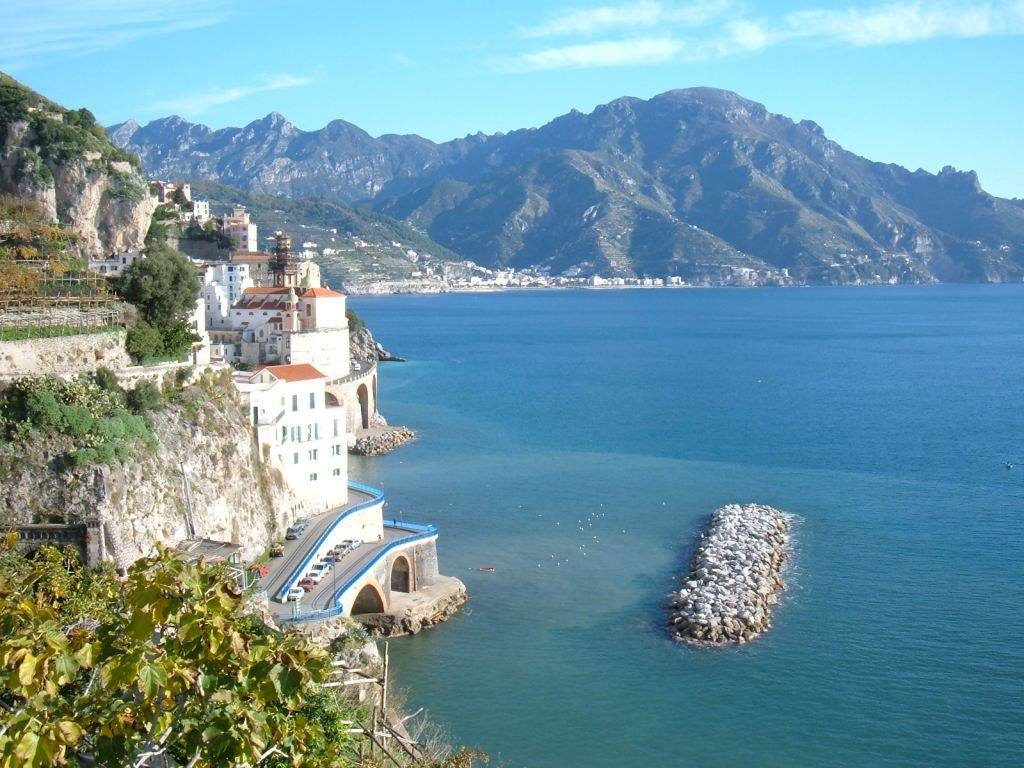 positano from naples ferry route extension showing the dramatic ancient arches and stone houses of atrani beach