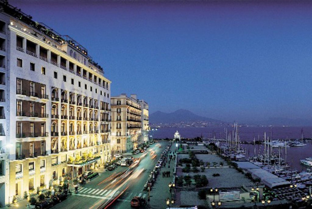 capri day trip from naples port photography showing large passenger ferries docked at molo beverello terminal