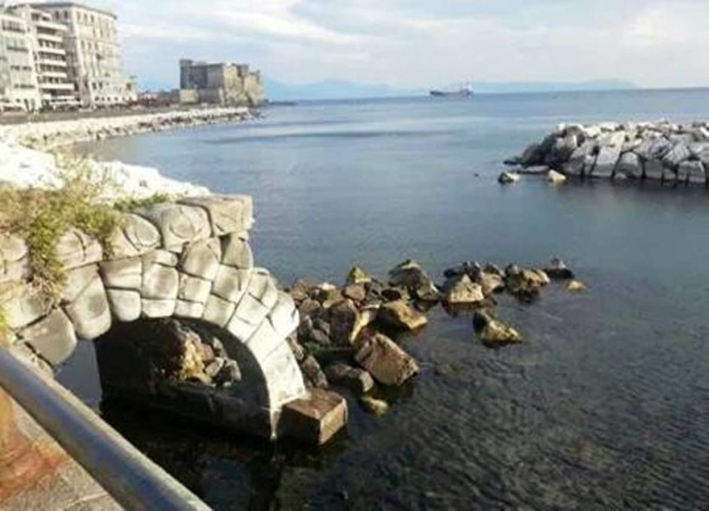 banchina santa lucia naples worth visiting or skip photography showing traditional skiffs near the stone fortress