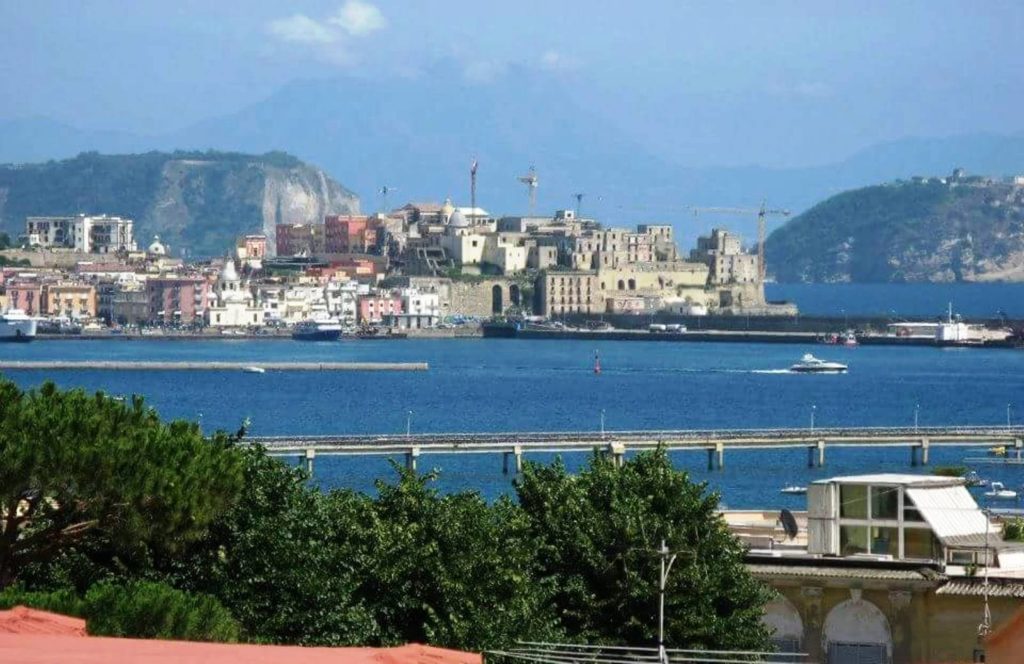 what to see near porto di pozzuoli italy showing the ancient columns of the macellum temple