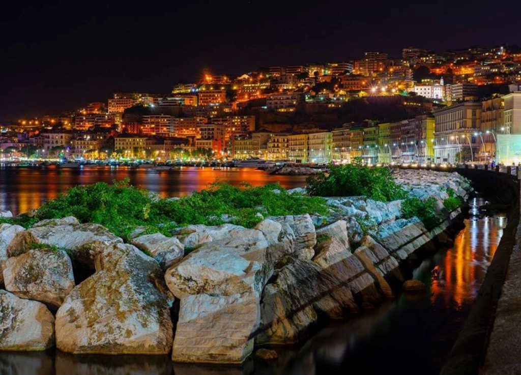 naples via partenope worth visiting seafront road castel dell ovo morning blue hour elegant hotel facades