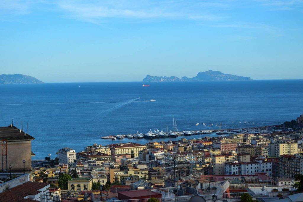 naples photography spots golden sunset light illuminating the gulf from via aniello falcone