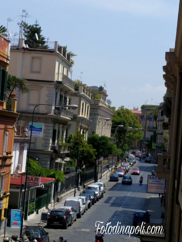 Via Crispi Naples Chiaia waterfront street with intact Liberty era 1920s building facades and original proportioned shopfronts in early morning light