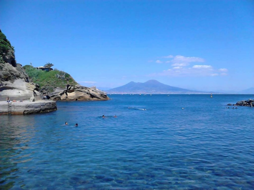 naples photography spots gaiola cove morning clear water roman ruins cliff composition