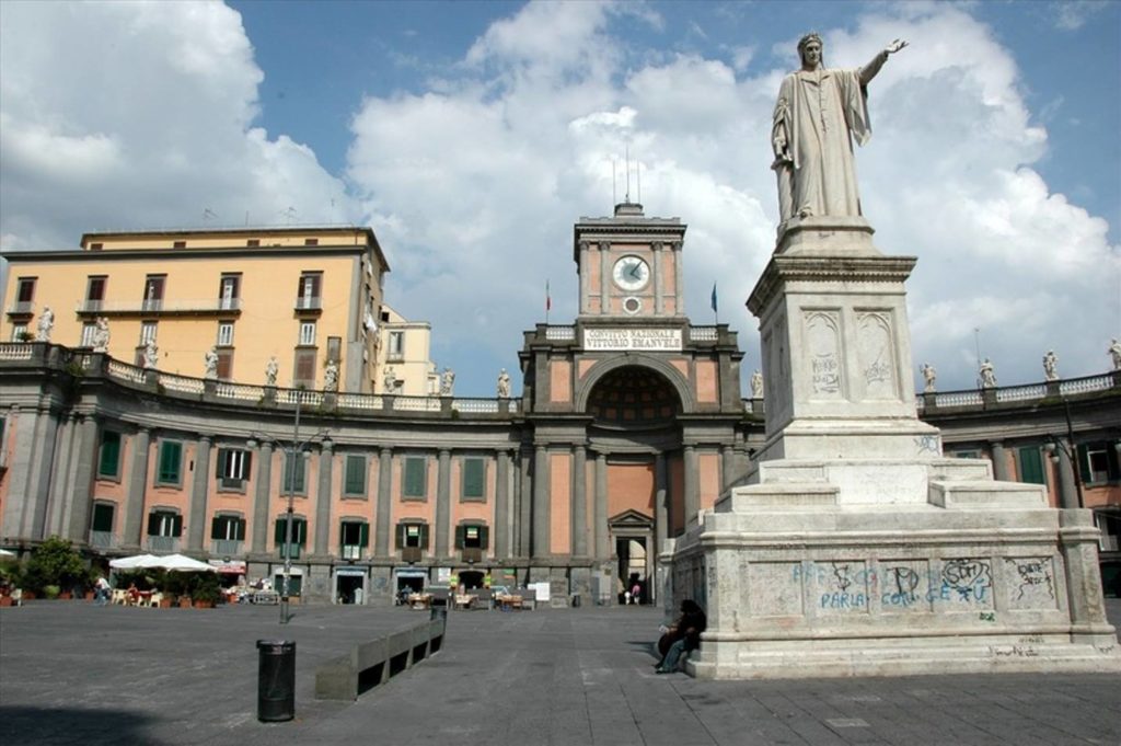 piazza dante napoli photo spots displaying the grand semicircular boarding school facade and dante statue cleanly illuminated