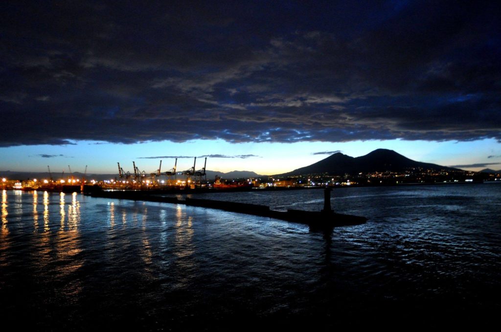 portonapoli naples photo spots showing massive cruise passenger ferries docked cleanly against the metropolitan skyline