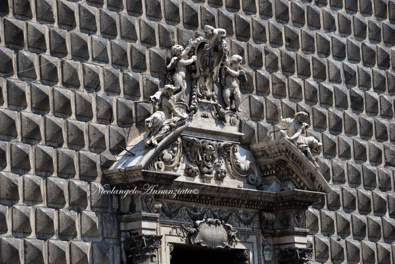 chiesa del gesu nuovo napoli photo spots featuring the iconic diamond-pointed stone facade under the morning sun cleanly